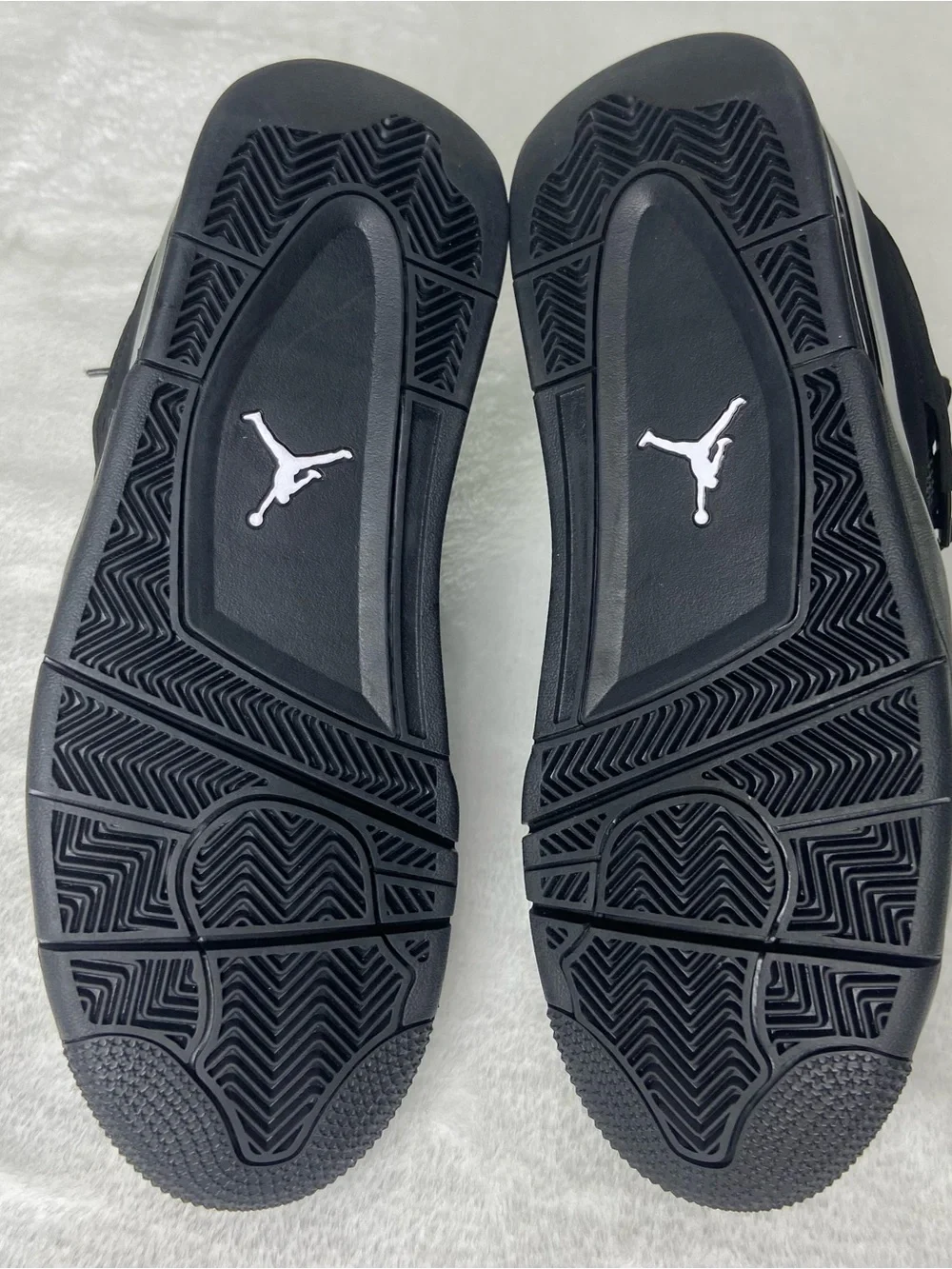 Jordan Men’s Black Retro 4 Sneakers